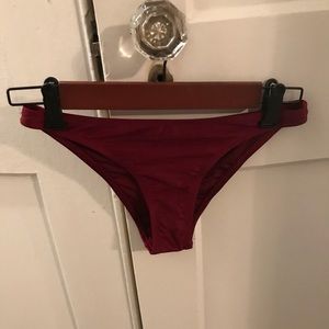 Red cheeky bathing suit bottoms